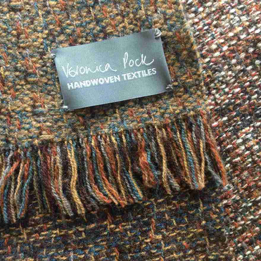 Woven scarf with label