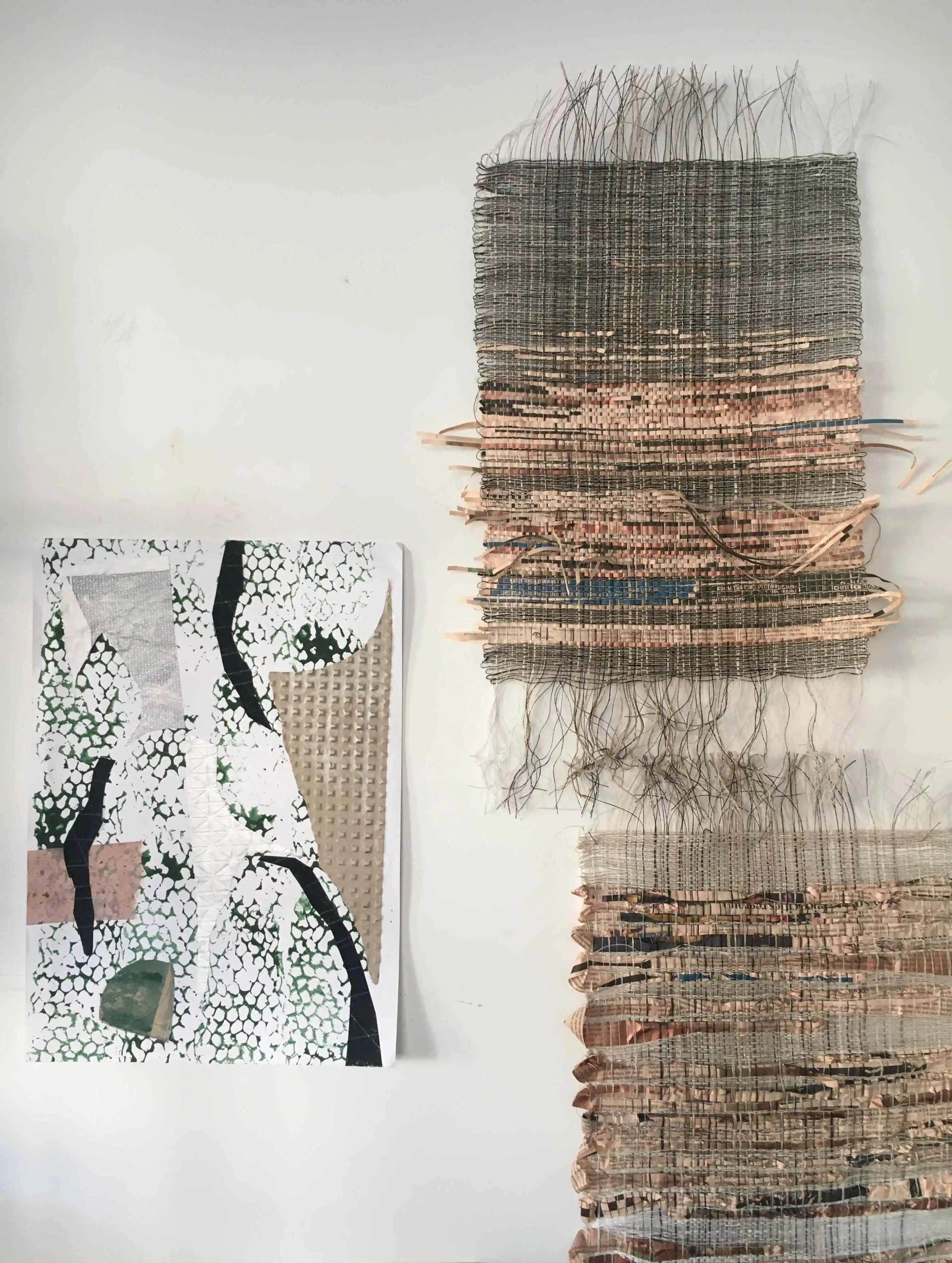 Studio view woven and mixed media art on wall