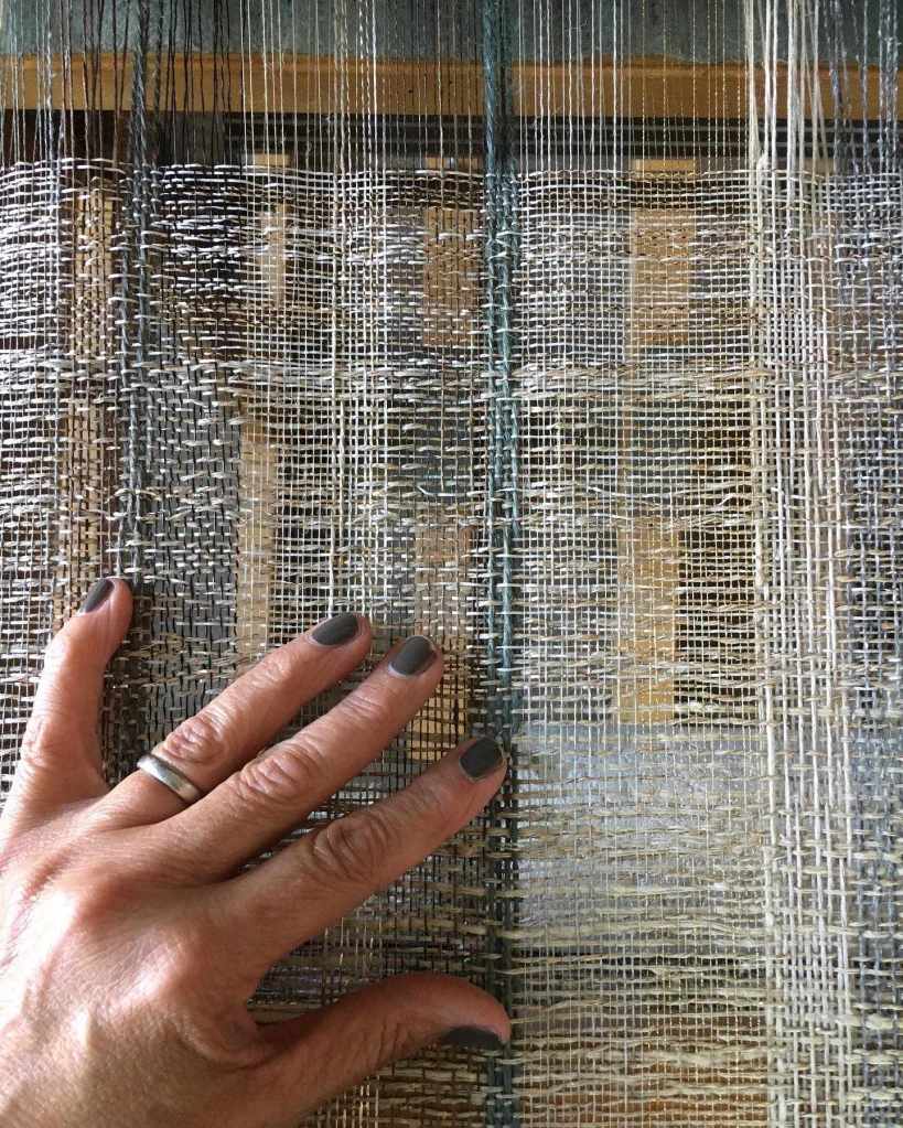 Linen, jute and woven wallhanging on loom