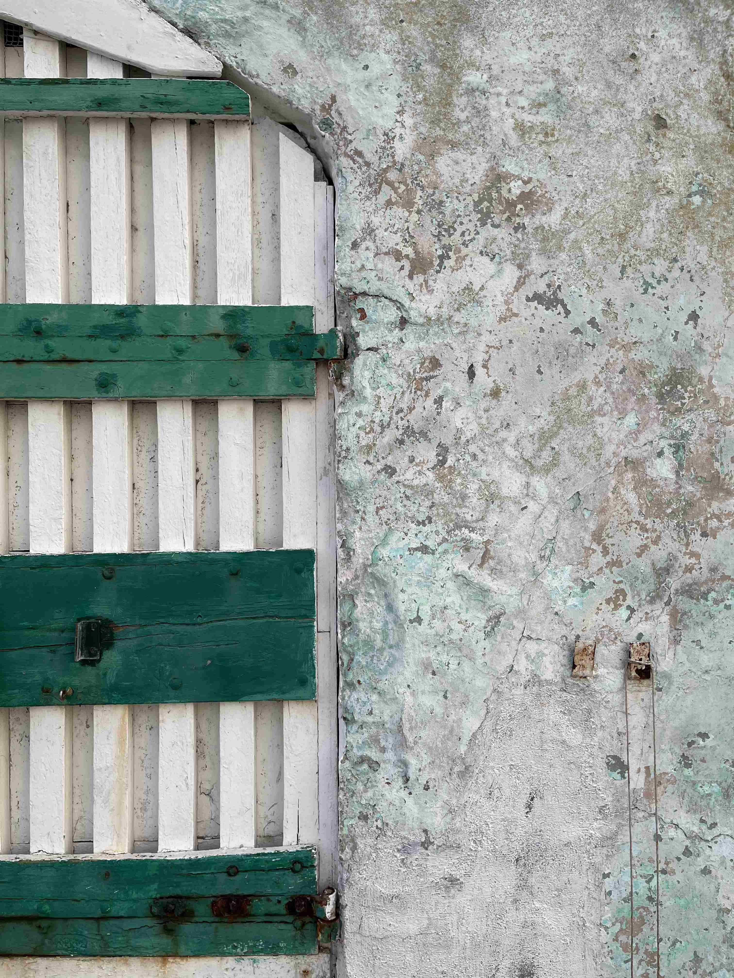 Beach cave door green and white