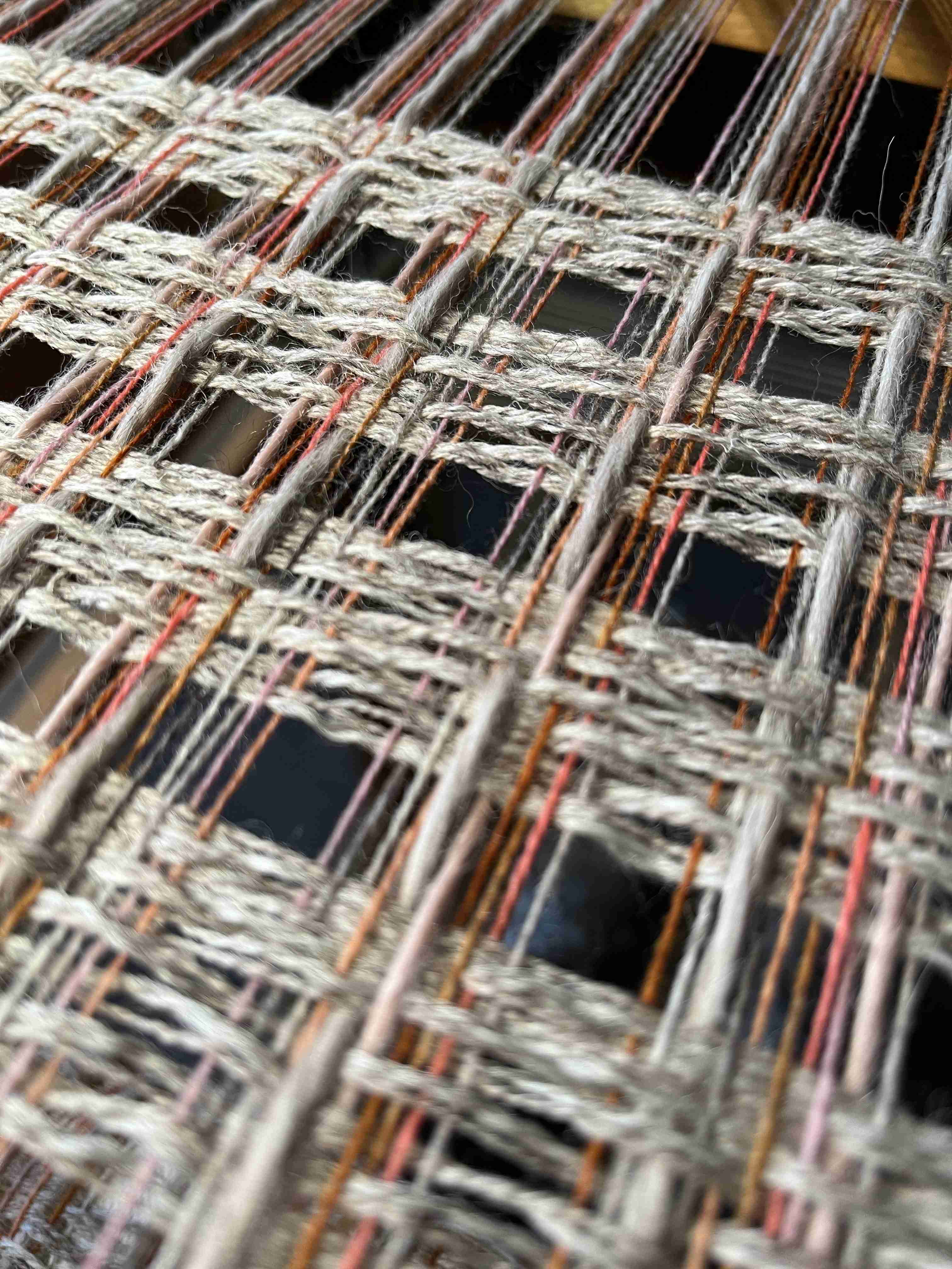 Open weave scarves on the loom