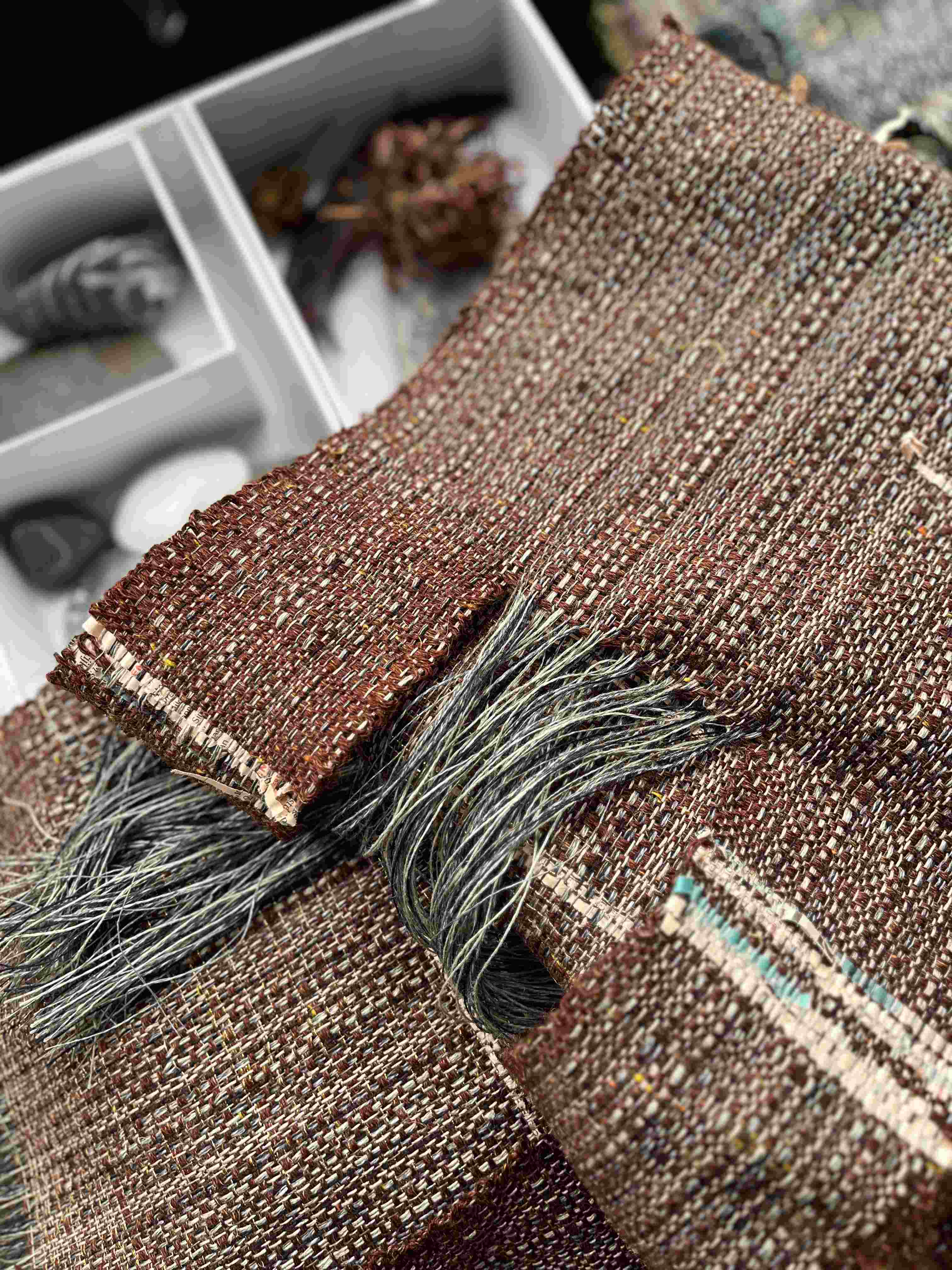 Earth colours weaving just off the loom